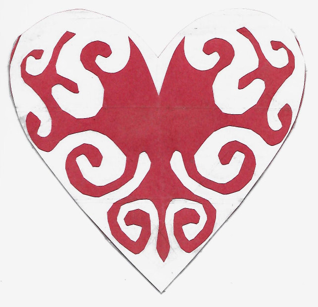 Laminated cut-paper heart-shaped envelope