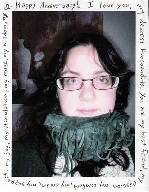 photograph of me bundled up in the scarf he hates, yet is still romantic because I bought it the weekend he proposed. It is ringed by the text 