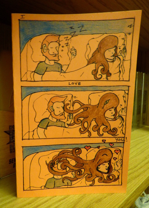 Comic of couple in bed with woman's hair becoming an octopus that wraps around her husband's face